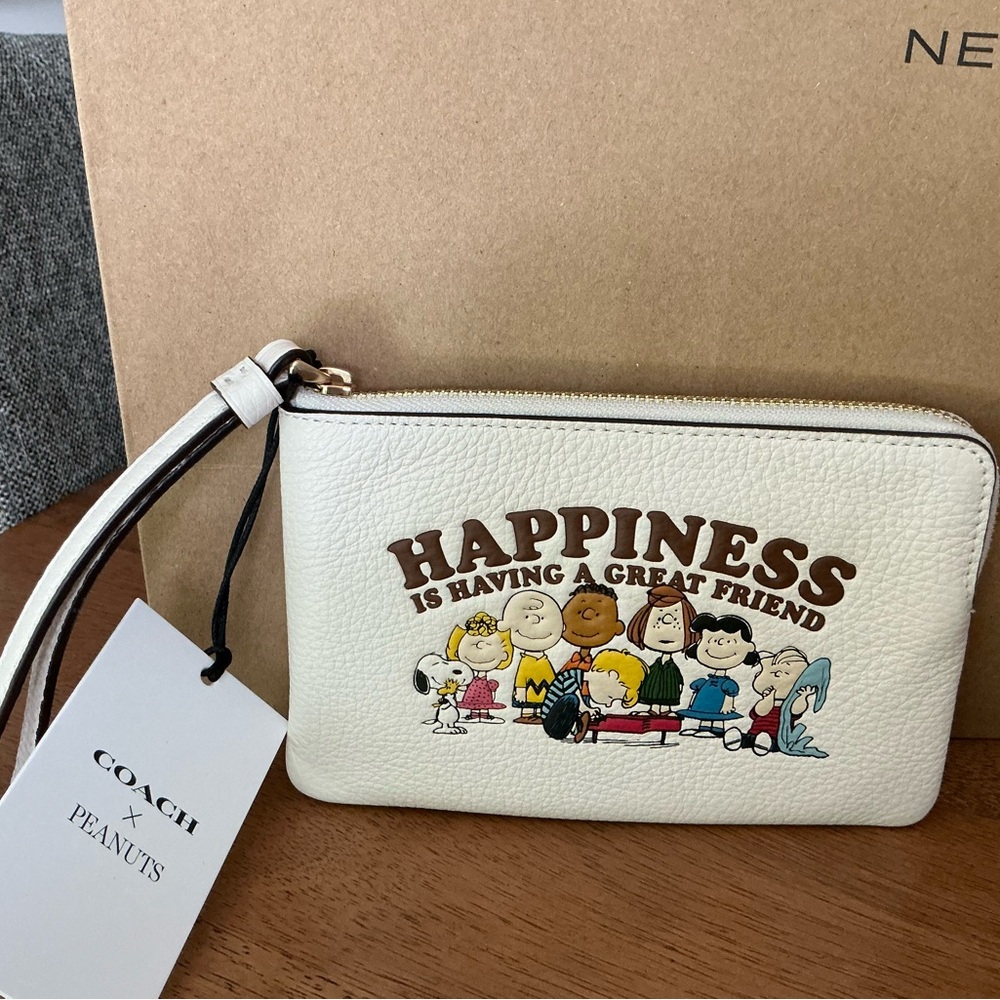 Coach Cream Peanuts 'Happiness' Graphic Wristlet